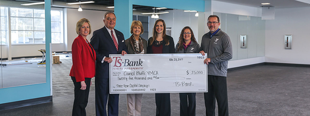 ts bank employees deliver check to ymca employees