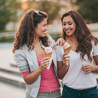 two girls with ice cream cones