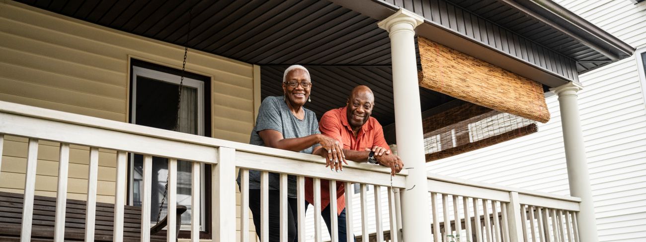 Couple standing on their porch