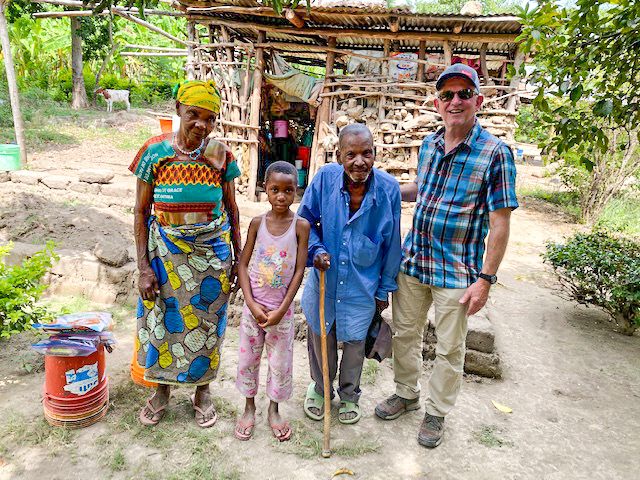 kim gibson with young girl and grandparents in africa