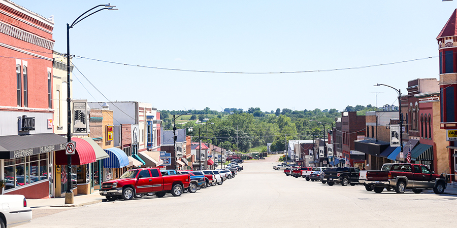 cars parked along downtown corning iowa