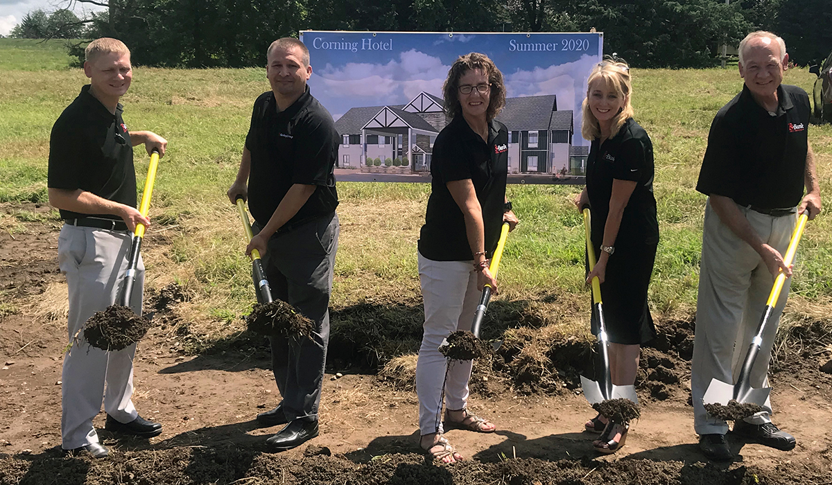 ts bank employees digging at new corning hotel location