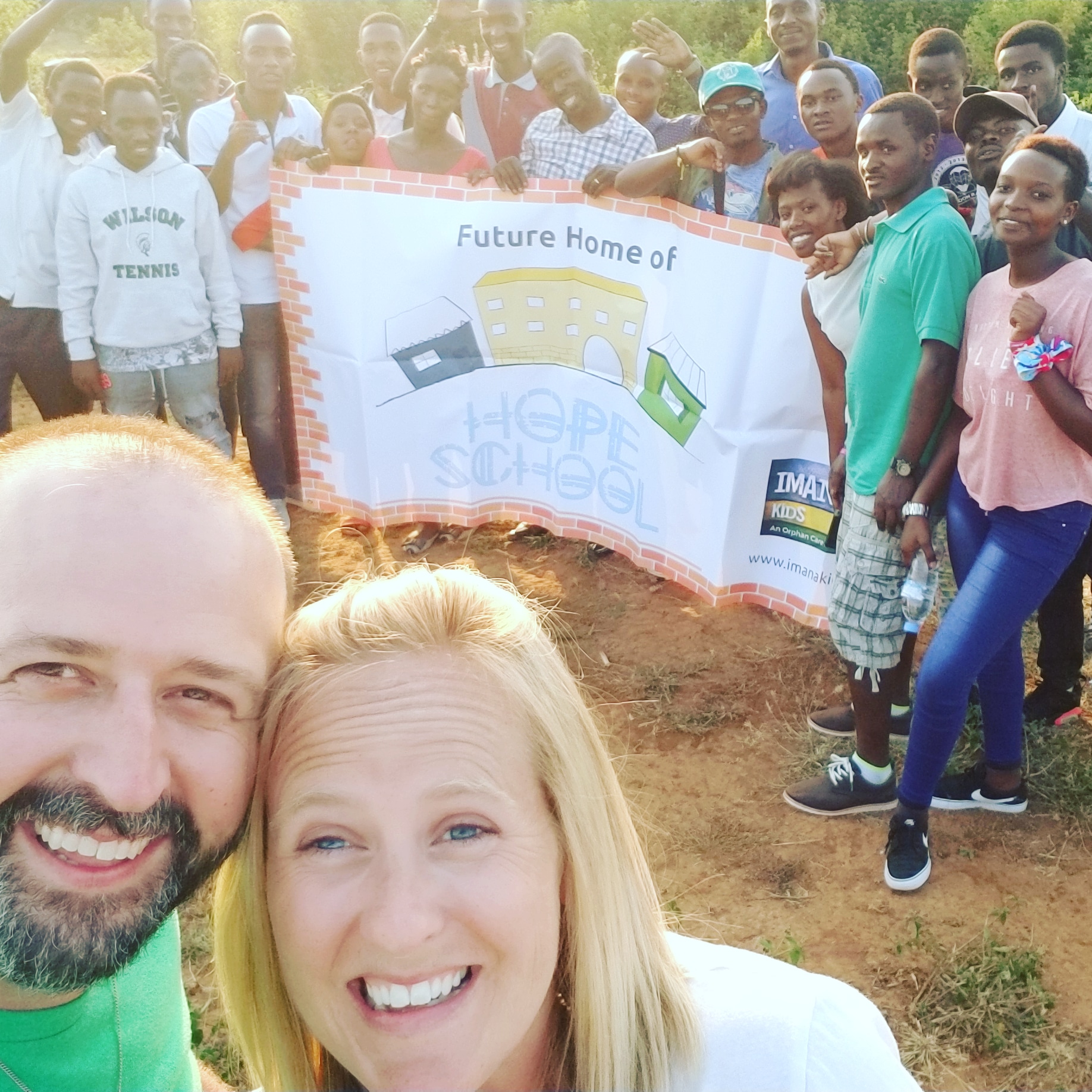 ryan and kara higgins in rwanda volunteering