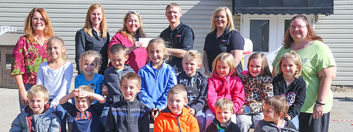 children at the daycare posing for a picture