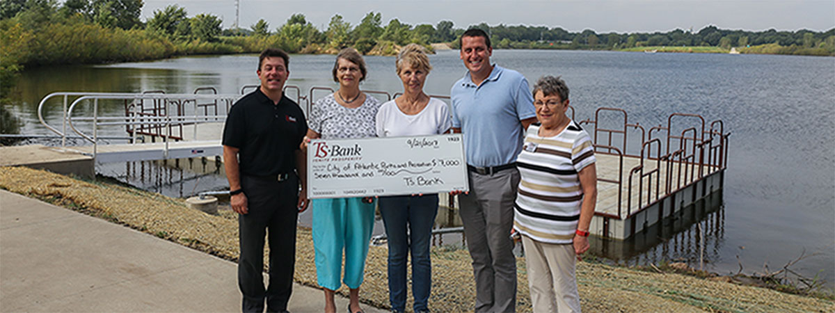 ts bank employees deliver check to atlantic parks and r