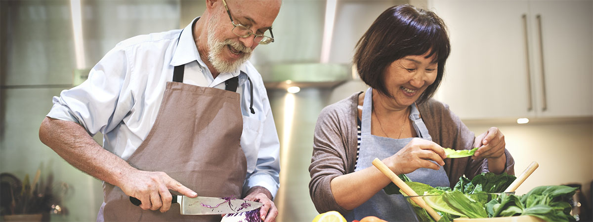 a couple taking a cooking class together