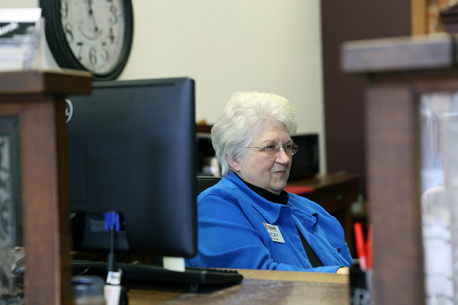 vicky putnam working at her computer at macedonia branch