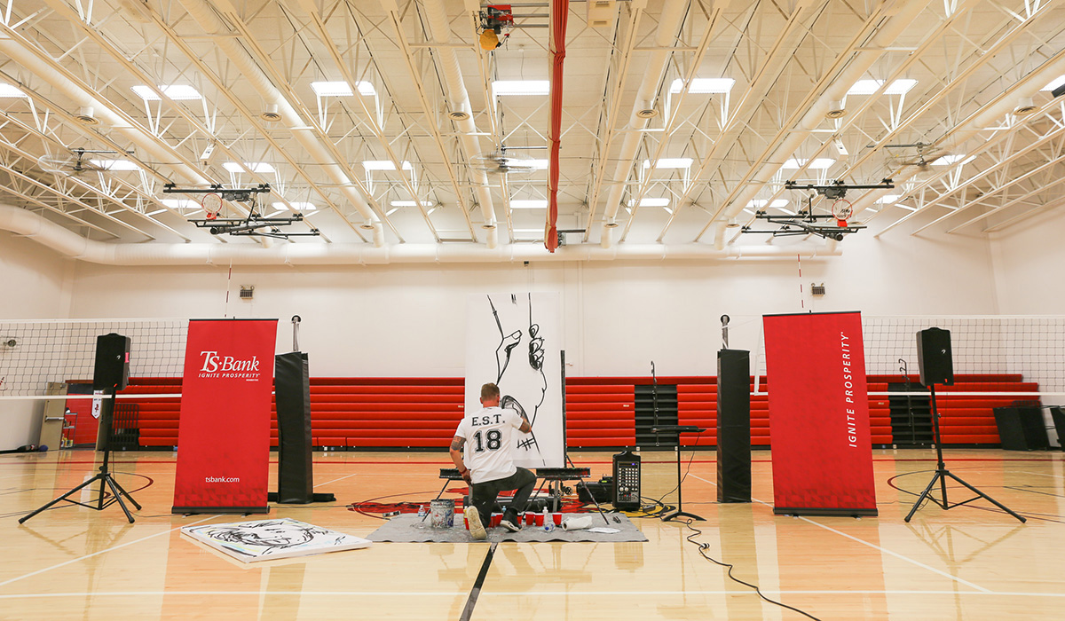 ts promise speaker engaging a gym of students